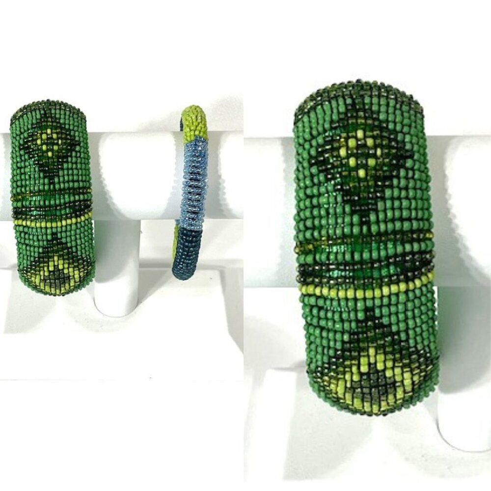Two handmade beaded bracelets in greens and blues.